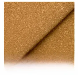 Macro shot of high-quality brown faux suede texture on a vintage tote bag