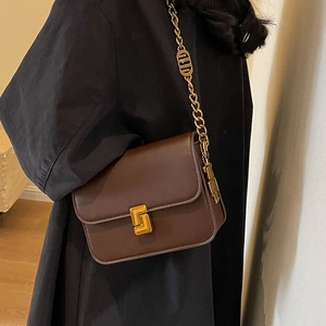 Classic dark brown square shoulder bag with gold chain strap and geometric metal buckle