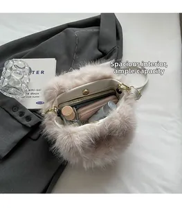 Detail of pink plush bucket bag interior showing spacious capacity and magnetic closure
