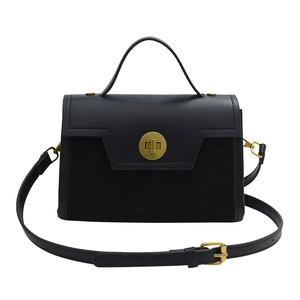 Classic black crossbody handbag with matte finish, top handle and golden round buckle