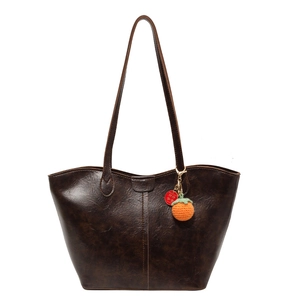 Retro deep brown large tote bag in oil wax leather with persimmon lucky charm