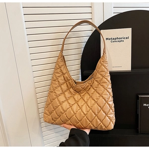 Quilted khaki hobo bag with a soft padded texture, ideal for everyday commute and styling