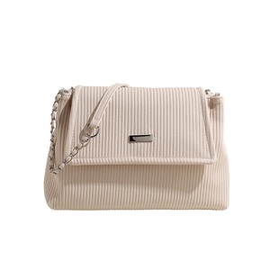 Chic cream corduroy shoulder bag with silver chain strap and minimalist square design