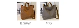 Detail of grey and brown canvas tote bags featuring sturdy handles and wide shoulder straps