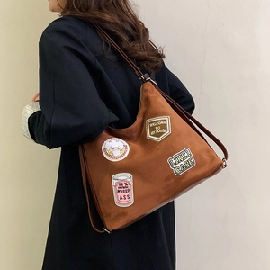 Retro brown oversized tote bag with vintage embroidery patches and leather shoulder straps