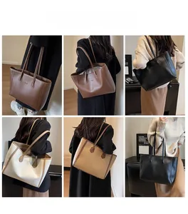 Detail view of large leather tote bags in brown, coffee, and black for commuting use