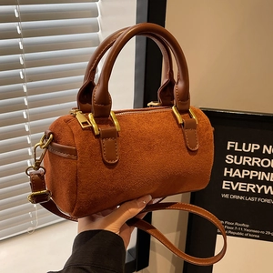 Retro frosted caramel Boston cylinder handbag with gold hardware and shoulder strap