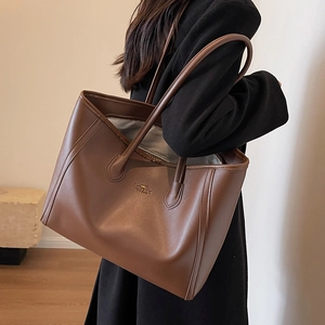 Minimalist large brown tote bag in premium PU leather for office and daily commuting