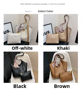Detail view of large faux leather tote bags in four colors with matching pouches and scarves