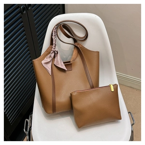 Brown litchi grain tote bag with a small zipper pouch and decorative purple silk scarf