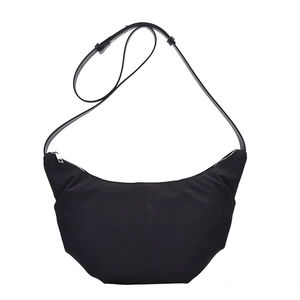 Large capacity black crescent crossbody bag with minimalist texture and leather strap