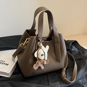 Retro dark brown litchi grain bucket bag with shoulder strap and bear charm