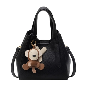 Classic black lychee pattern bucket bag with cute monkey pendant and gold hardware