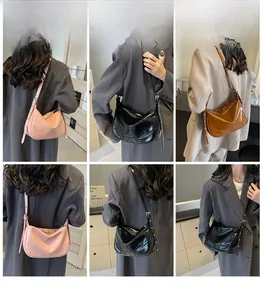 Three-color collage of glossy wrinkled leather crescent moon bags shown on a model