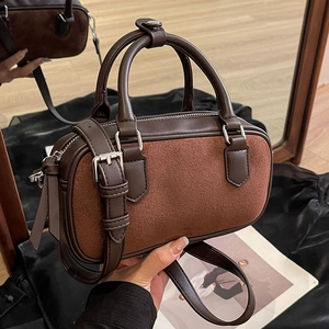 Brown frosted leather Boston handbag with dual handles and adjustable shoulder strap