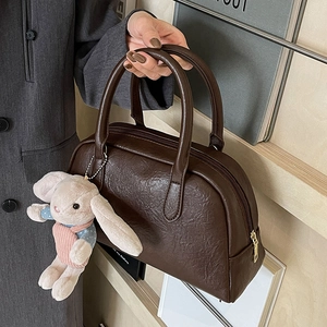 Retro deep brown Boston bag with litchi texture leather and a cute bunny pendant