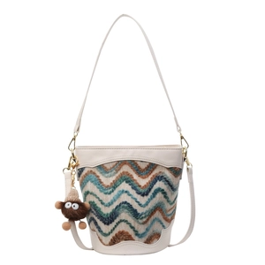 Women's wave pattern bucket bag with retro knit texture and cute brown plush monster charm