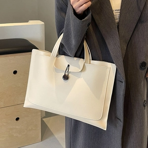 Cream white rectangular tote bag with minimalist button closure and double handles