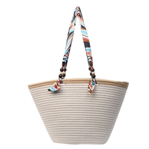 Woven straw tote bag with multi-color silk scarf handle for summer beach vacation
