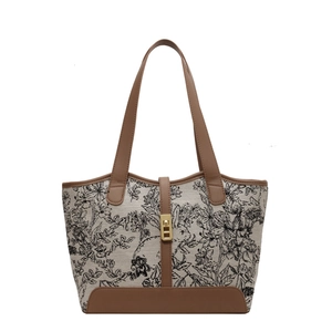Floral canvas tote bag with brown leather trim and golden buckle for women commuting