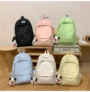 Minimalist waterproof nylon backpacks in six pastel colors with cute plush pendants