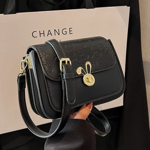 Classic black PU leather crossbody bag featuring bunny lock and embossed patterns