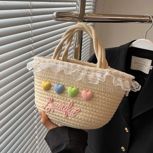 Elegant beige woven straw handbag with lace trim and colorful 3D heart decorations