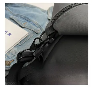 Macro detail of waterproof oxford fabric travel bag with durable matte metal hooks
