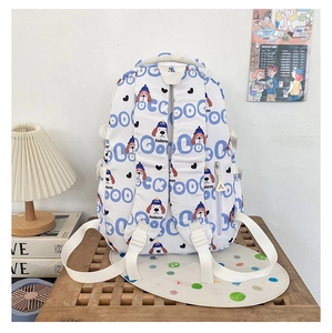 Détail du sac à dos avec imprimé chiot, boucle latérale et poche zippée cachée