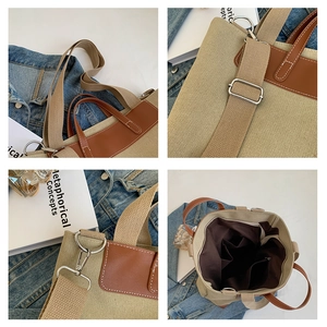 Detalles del bolso tote de lona con costuras de cuero y correa de hombro ajustable