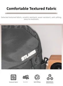 Detail showing high-density woven fabric texture and printed STLANGS logo on the bag
