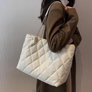 Chic quilted nylon tote bag in cream with gold chain strap for women's autumn fashion