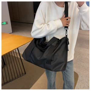 Large capacity black waterproof oxford travel bag with adjustable strap on model
