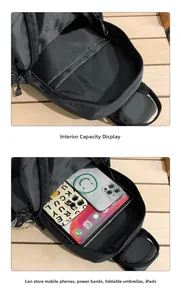Detailed view of spacious black nylon bag interior showing storage capacity for iPad and phones
