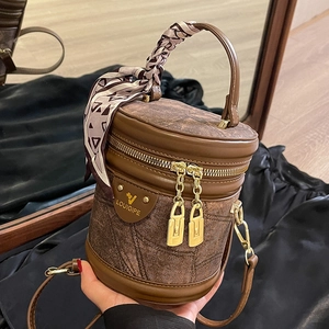 Sac seau cylindrique marron rétro en toile à motifs avec poignée en foulard