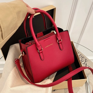 Elegant red leather tote bag for weddings with top handles and detachable shoulder strap
