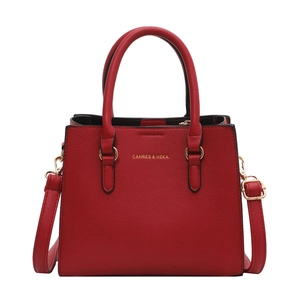 Elegant red leather handbag for weddings with top handles and adjustable shoulder strap