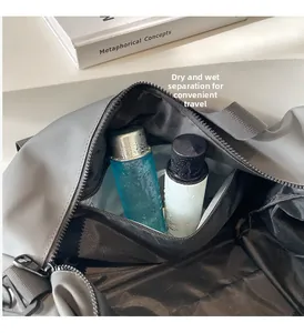 Detail view of dry and wet separation pocket inside grey nylon travel duffel bag