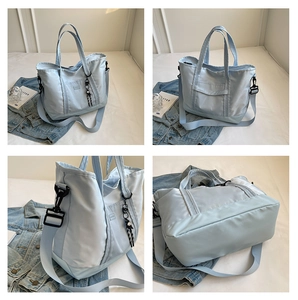 Multi-angle views of a light blue nylon travel tote with adjustable straps and logo detail