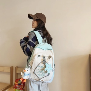 Zaino in tela stile giapponese con motivo astronauta e ciondolo a forma di oca