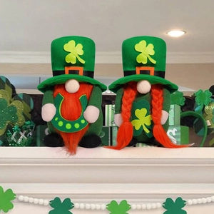 Detailed view of handmade St. Patrick's Day gnomes with green hats and orange beards