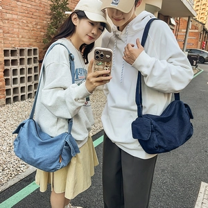Retro denim canvas crossbody bag with adjustable strap and large capacity design