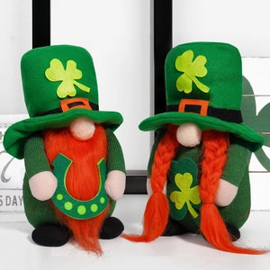 Detail shot of St. Patrick's Day gnomes with green shamrock hats and knitted textures
