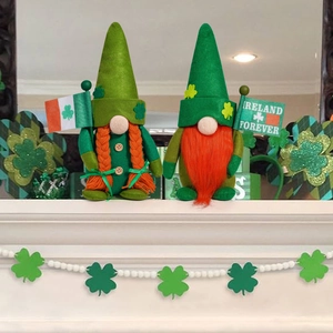 Close-up of Saint Patrick's Day gnomes with Ireland Forever flag on a fireplace mantle