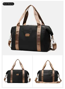 Détails du sac de voyage en tissu Oxford noir avec sangles dorées et logo