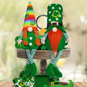 Detail view of St. Patrick's Day gnome dolls with rainbow hats and lucky elements