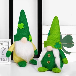 Detailed plush St. Patrick's Day gnomes featuring green shamrocks and white beards on display