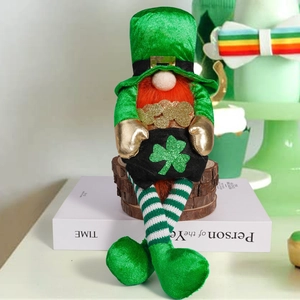 Detail of St. Patrick's Day gnome featuring a green hat, orange beard and a lucky clover bag