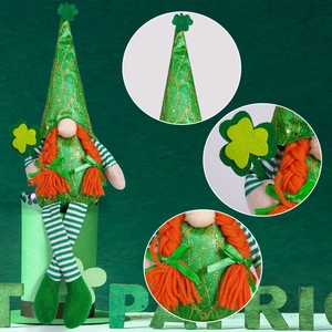 Detail view of St. Patrick's Day gnome with green shamrock, orange braids, and glitter hat