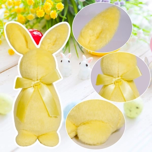 Détails de la figurine lapin de Pâques floqué jaune avec nœud satiné et texture fine